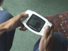 A Gameboy portable games console (http://www.bbc.co.uk/schools/gcsebitesize/business/images/games_console.jpg)