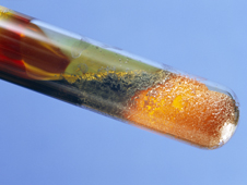 mixture heated in a test tube (http://www.bbc.co.uk/schools/gcsebitesize/science/images/react_comp_1.jpg)