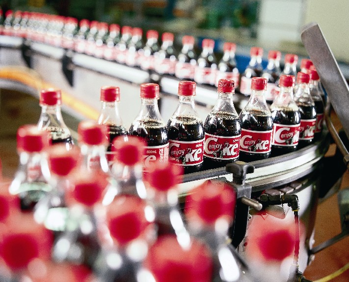 (http://asianmalerevolutions.com/files/consumerism---mass-production-coca-cola.jpg)