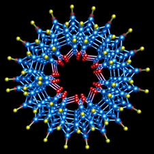 atoms arranged in circular patterns (http://www.bbc.co.uk/schools/gcsebitesize/science/images/spl_nanotube.jpg)