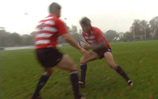 A rugby player dodges an opponent (http://www.bbc.co.uk/schools/gcsebitesize/pe/images/speed.jpg)